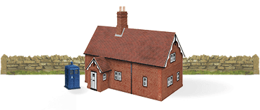 A figurine of a farm house