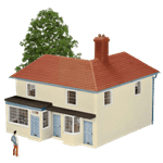 A figurine of a large residential home