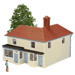 A figurine of a large residential home