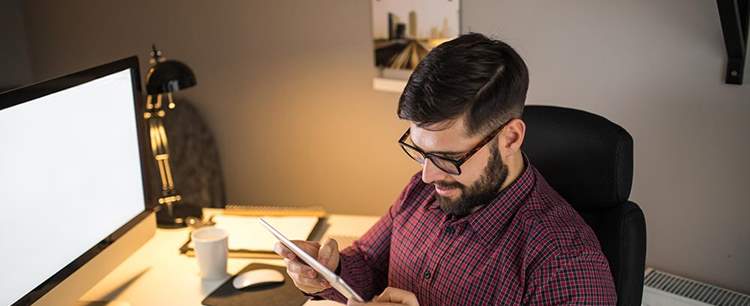 man reading about working from home tips