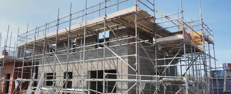 House in scaffolding in the investment sector