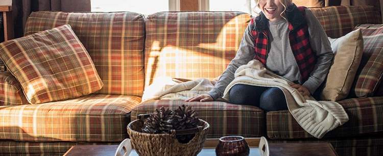 Woman on a couch during the cold weather