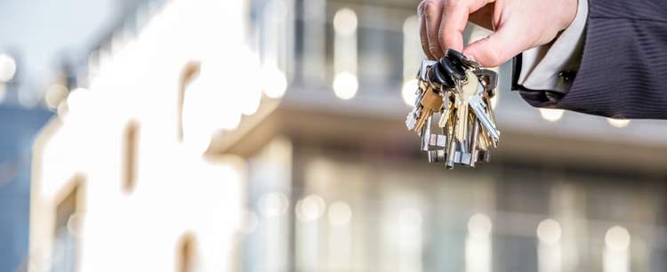 Keys dangling from a hand